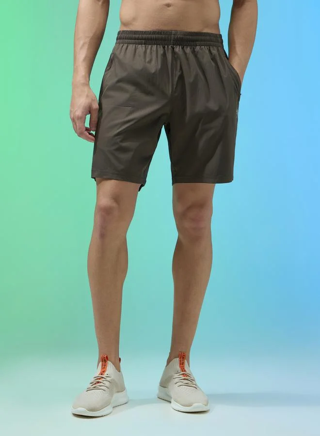 تكنوسبورت شورت رياضي رجالي سادة بقصة مريحة